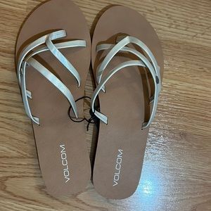 White Volcom sandals
